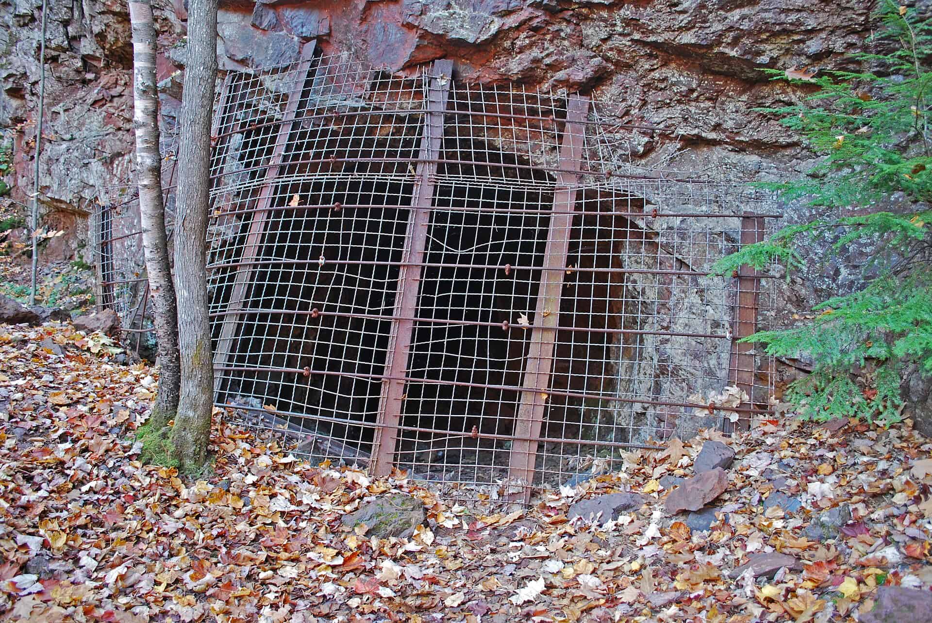 The gated tunnel entrance at Pit No. 1 of the Jackson Mine in Negaunee, Michigan.