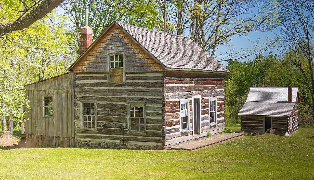 Restored hand-hewn log cabins of the Victoria mining company town in Ontonagon County, Michigan.