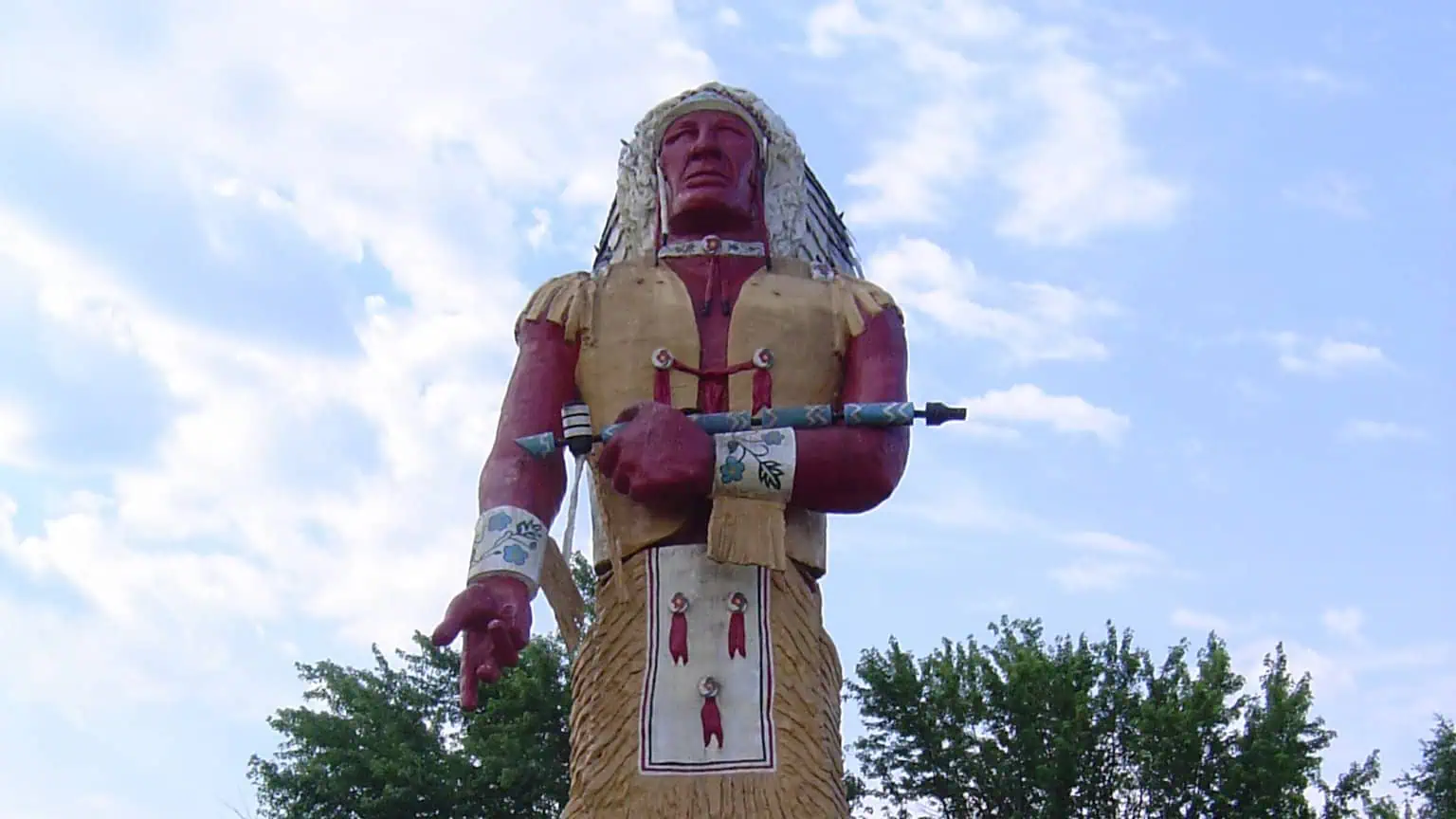 The 52-foot Hiawatha statue standing above Ironwood, Michigan, seen from the base looking up.