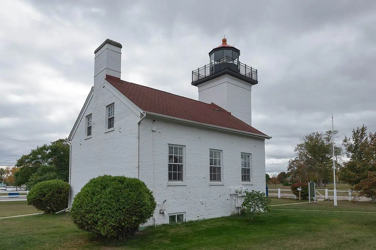 The red brick tower and keeper’s dwelling of the Sand Point Lighthouse in Escanaba, Michigan.