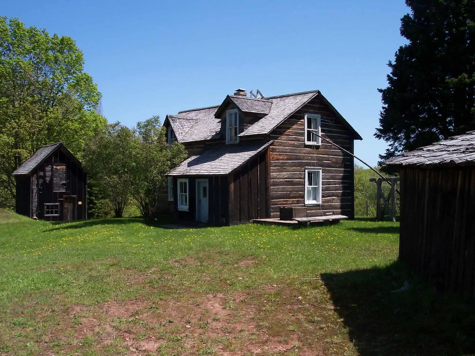 Log farm buildings at the Hanka Homestead, a Finnish farmstead in the Copper Country.