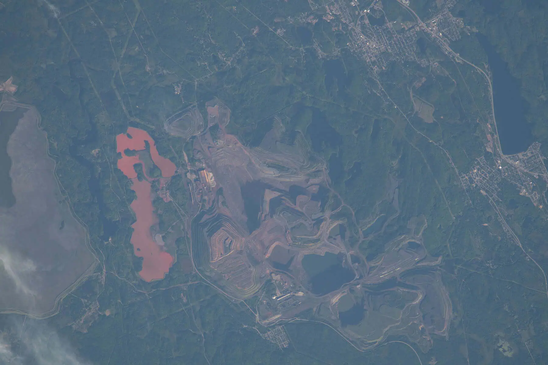 Satellite view of the Tilden and Empire iron mine pits south of Ishpeming, Marquette County. Photo: NASA, public domain, via Wikimedia Commons