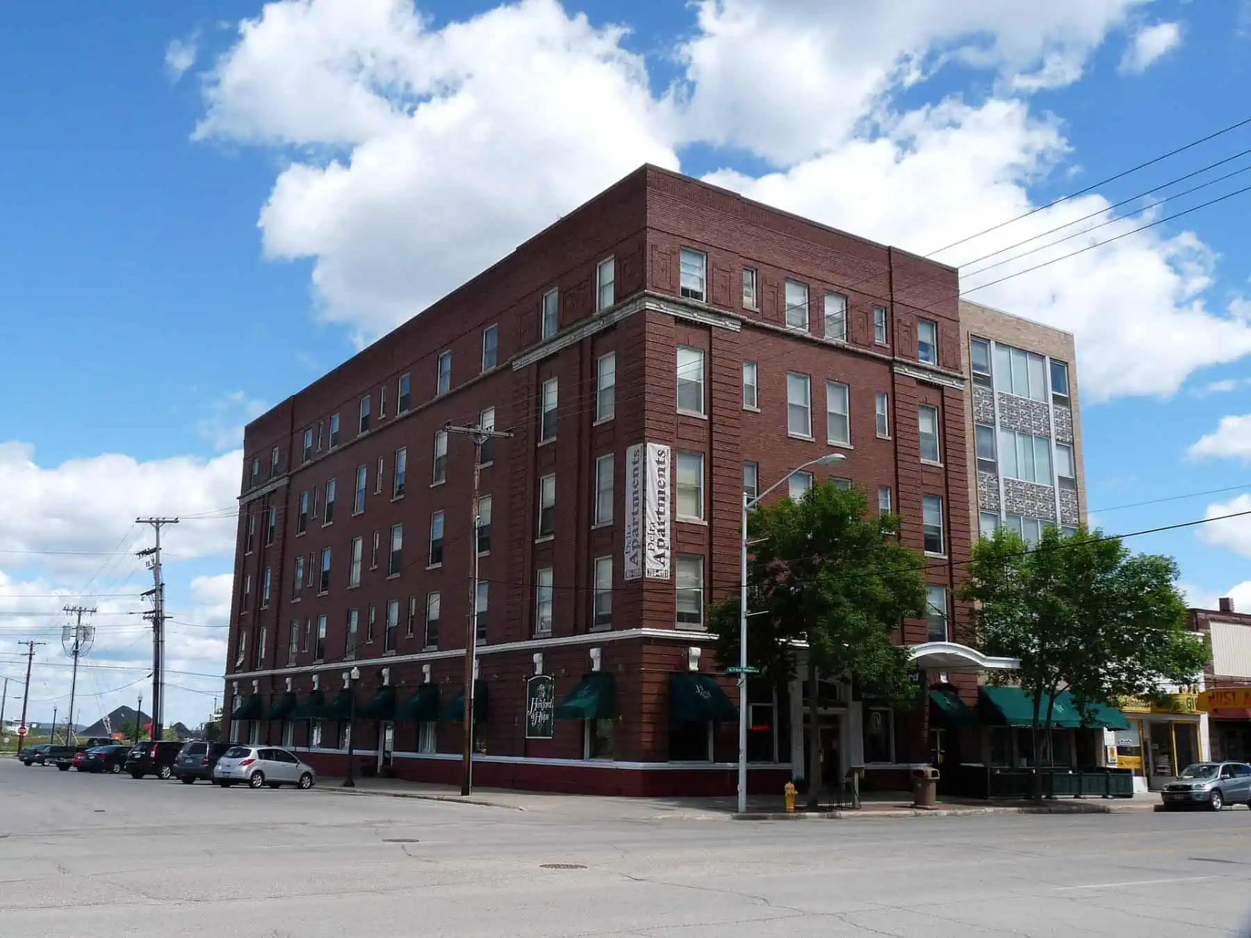 The five-story brick former Delta Hotel on Ludington Street in downtown Escanaba. Photo: Jeff the quiet, public domain.