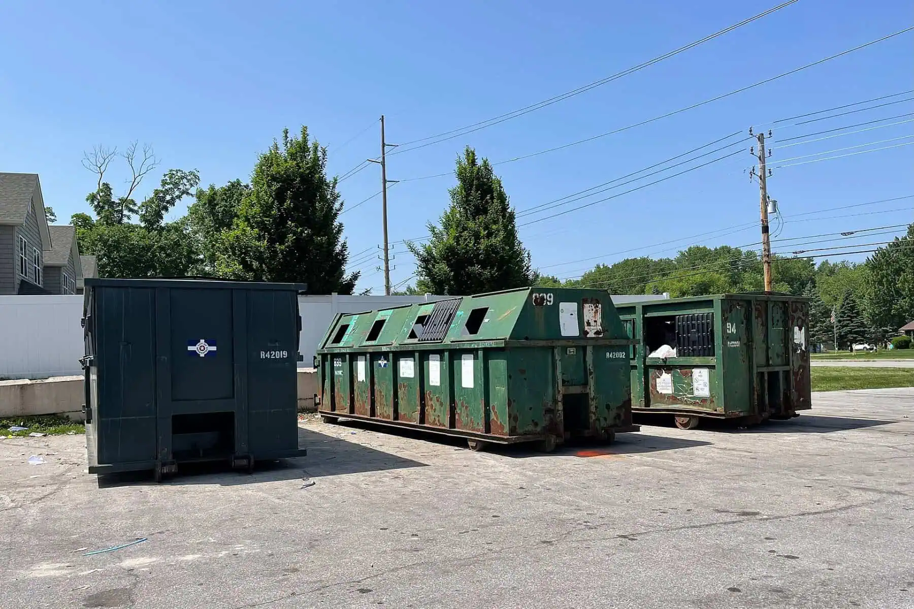 Green recycling containers at a public drop-off site. Illustrative file photo by Sarah Stierch, CC BY 4.0.